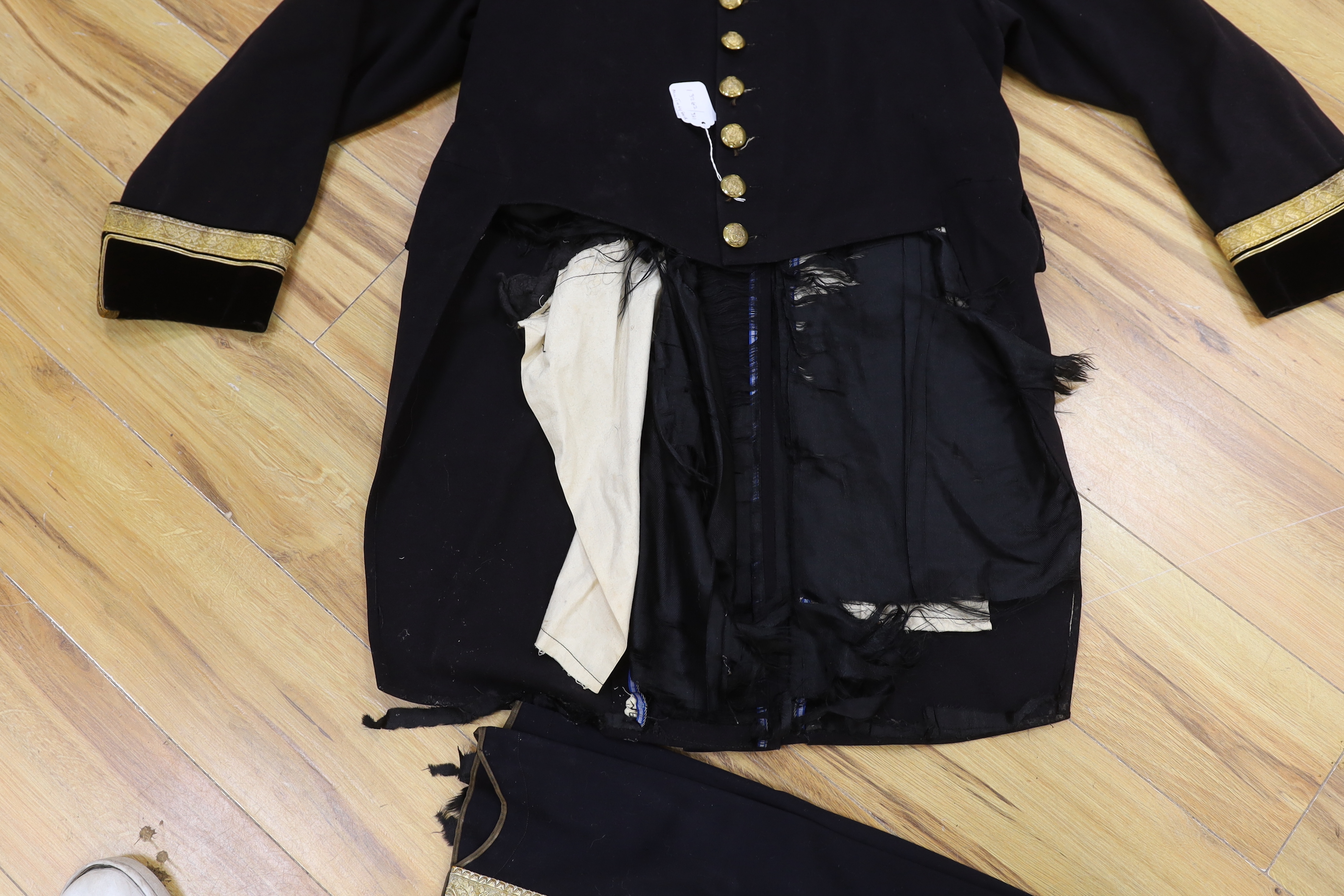 A military black wool dress uniform, with gold decorative braiding
